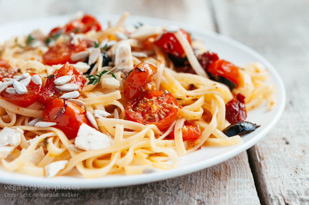 Stock photo of Tagliatelle With Roasted Cherry Tomatoes and Olives