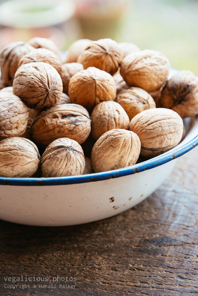 Stock photo of Bowl with organic walnuts