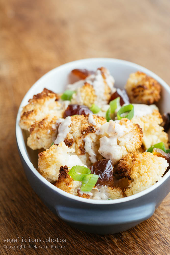 Stock photo of Roasted Cauliflower with Dates and Tahini Dressing