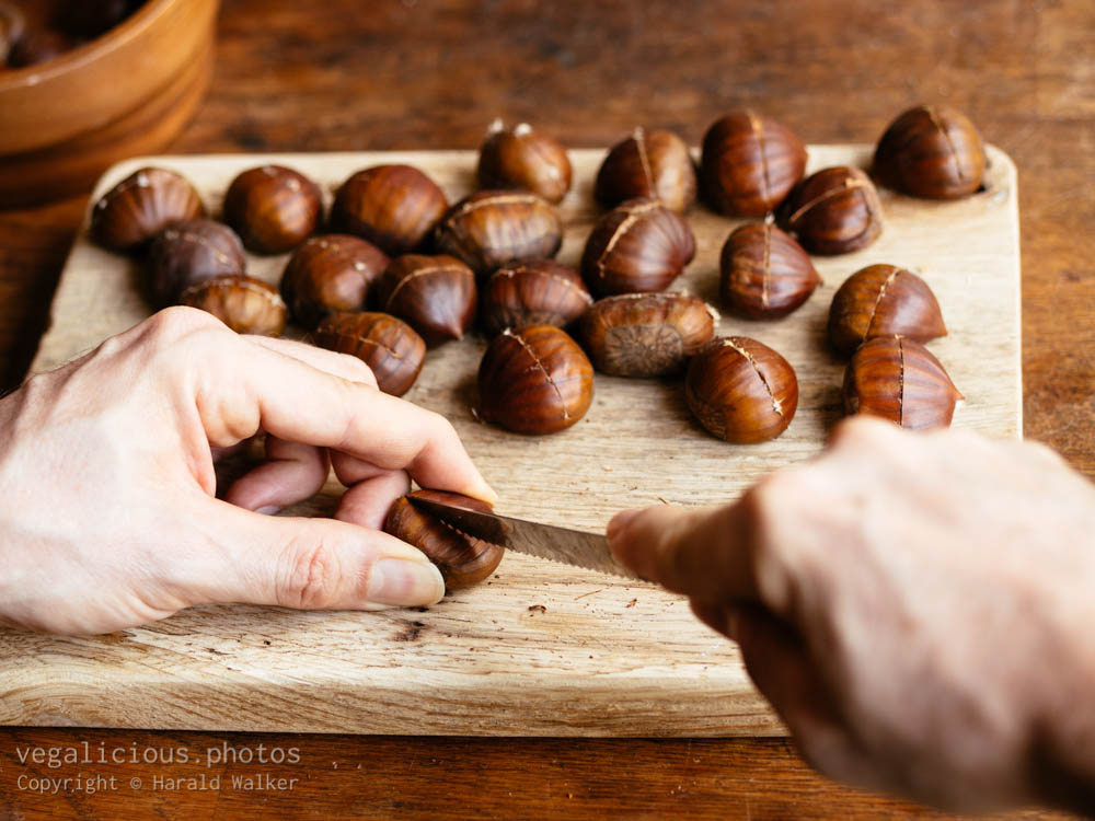 Stock photo of Scoring chestnuts