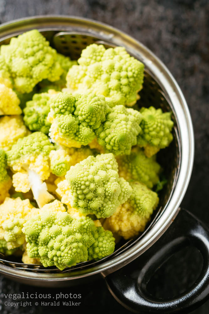 Stock photo of Romanesco in a pot with steamer