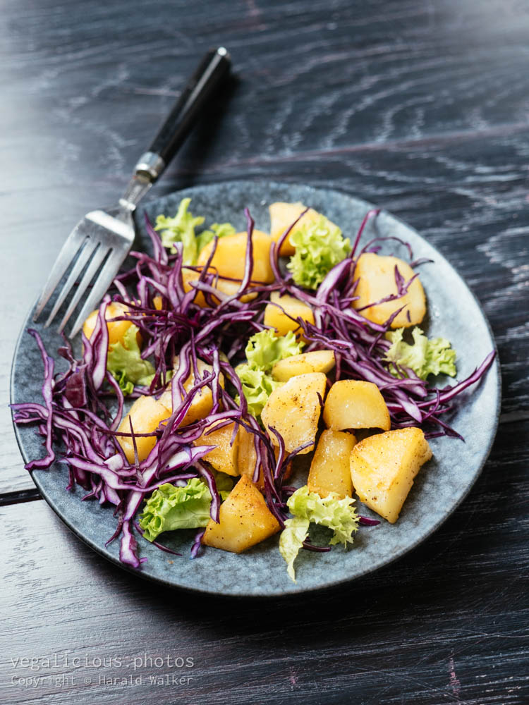 Stock photo of Warm Potato Salad with Red Cabbage