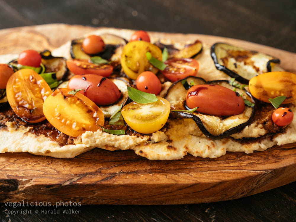 Stock photo of Flatbread with Hummus, Eggplant and Tomatoes