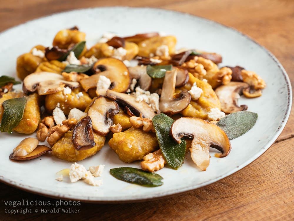 Stock photo of Pumpkin Gnocchi with Mushrooms and Walnuts, Sage Buttered Sauce