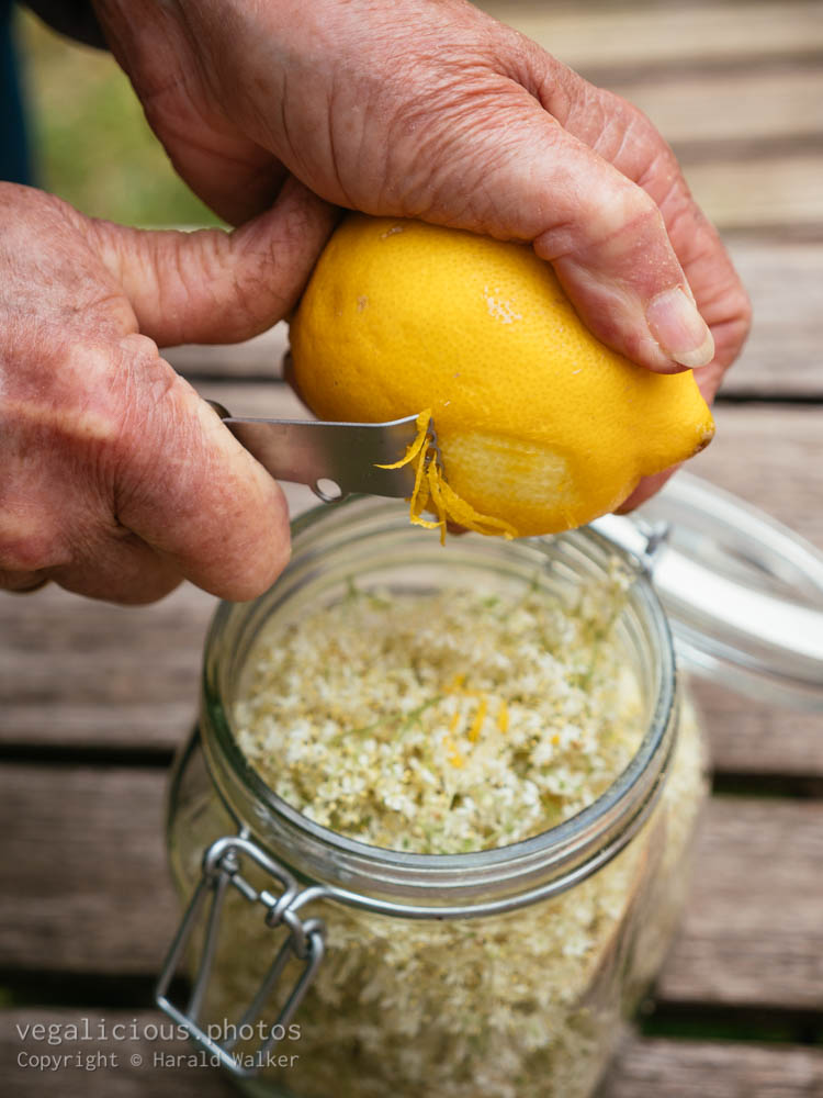 Stock photo of Adding lemon zest