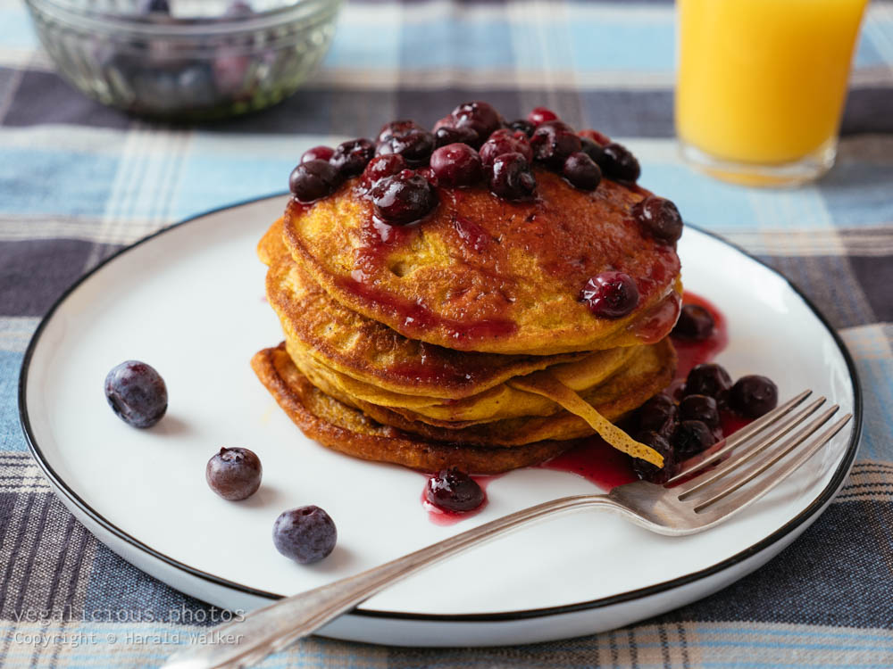 Stock photo of Pumpkin Pancakes with Blueberry Sauce