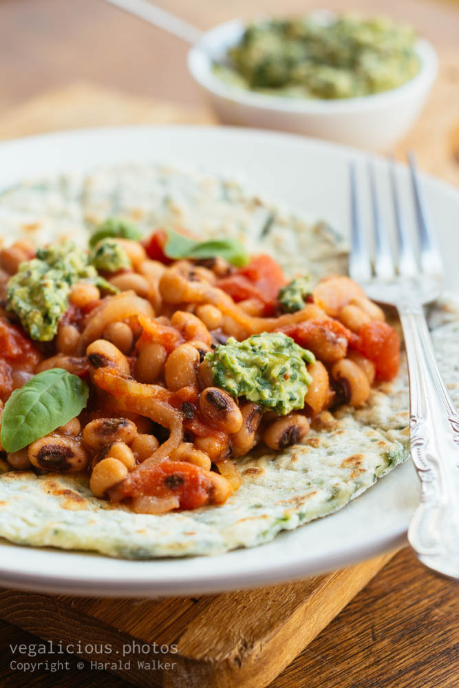 Stock photo of Spinach Flatbreads with Blackeyed-Pea Tomato Topping and Spinach Pesto