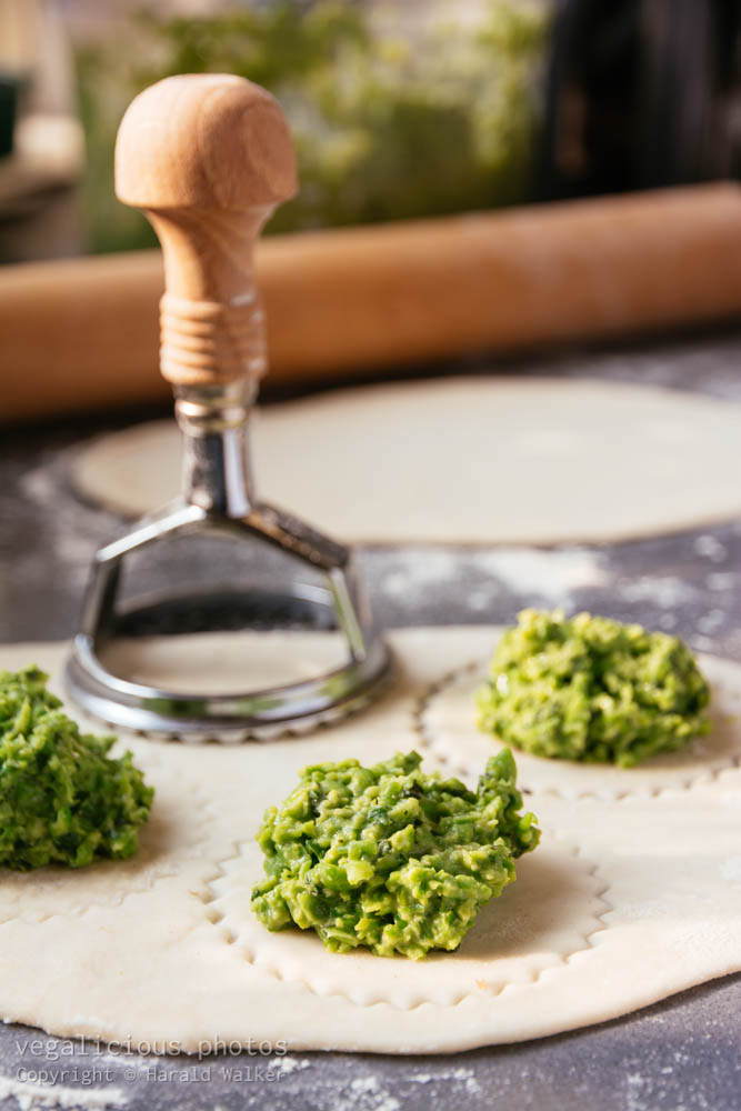Stock photo of Making pea ravioli