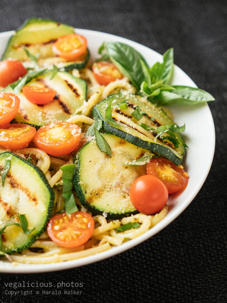 Stock photo of Pasta with Basil Pesto, Grilled Zucchini and Cherry Tomatoes