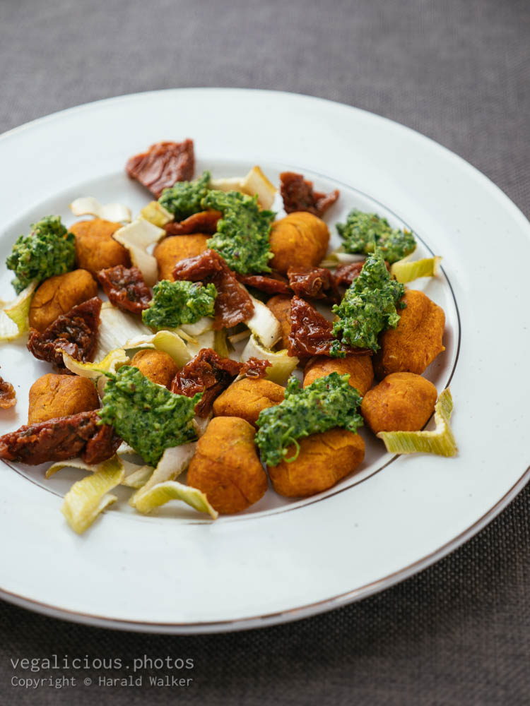 Stock photo of Winter Squash Gnocchi with Roasted Fennel and Spinach Pesto