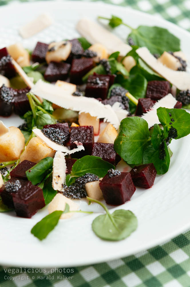 Stock photo of Beet and Pear Salad On Watercress with Poppyseed Dressing
