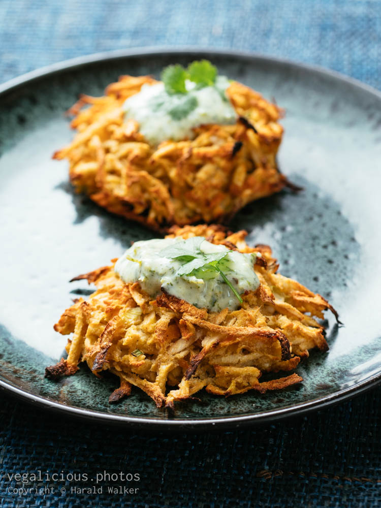 Stock photo of Parsnip, Carrot Fritters with Yogurt Zhoug Sauce