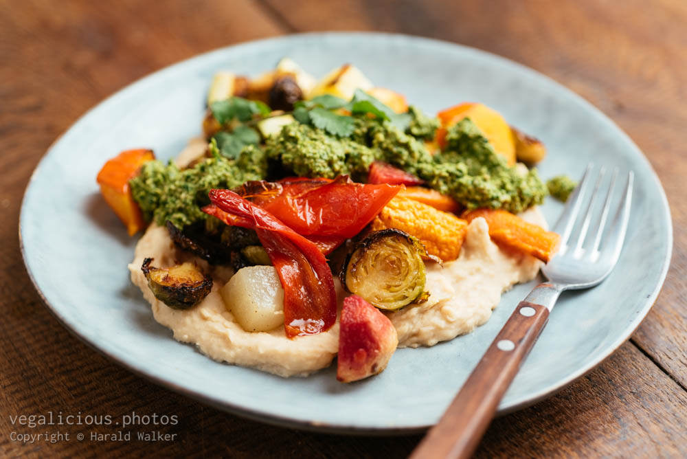Stock photo of Roasted Vegetables on Butter Bean Hummus with Zhoug
