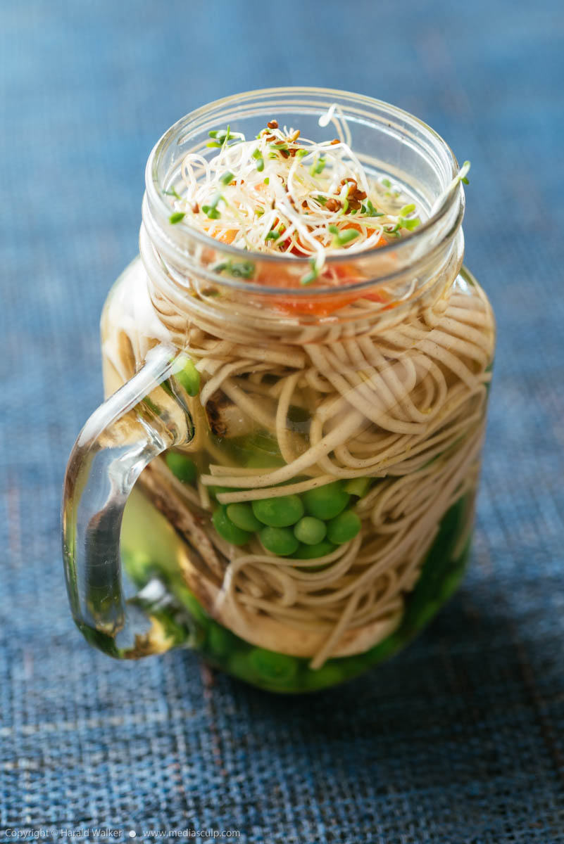 Stock photo of Asian soup in a jar