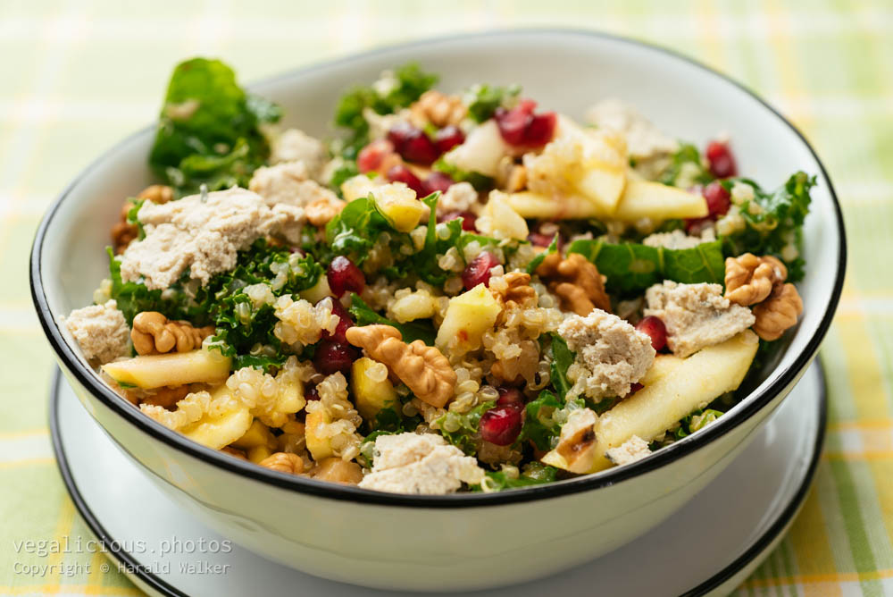 Stock photo of Kale Salad with Apples, Walnuts and Pomegranates