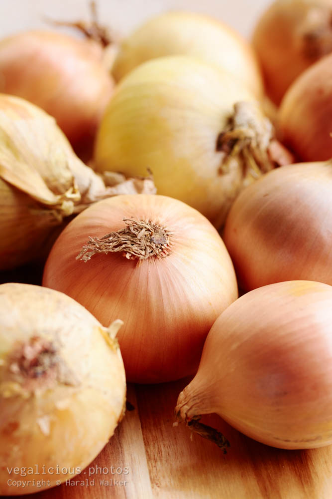 Stock photo of Onions on a cutting board