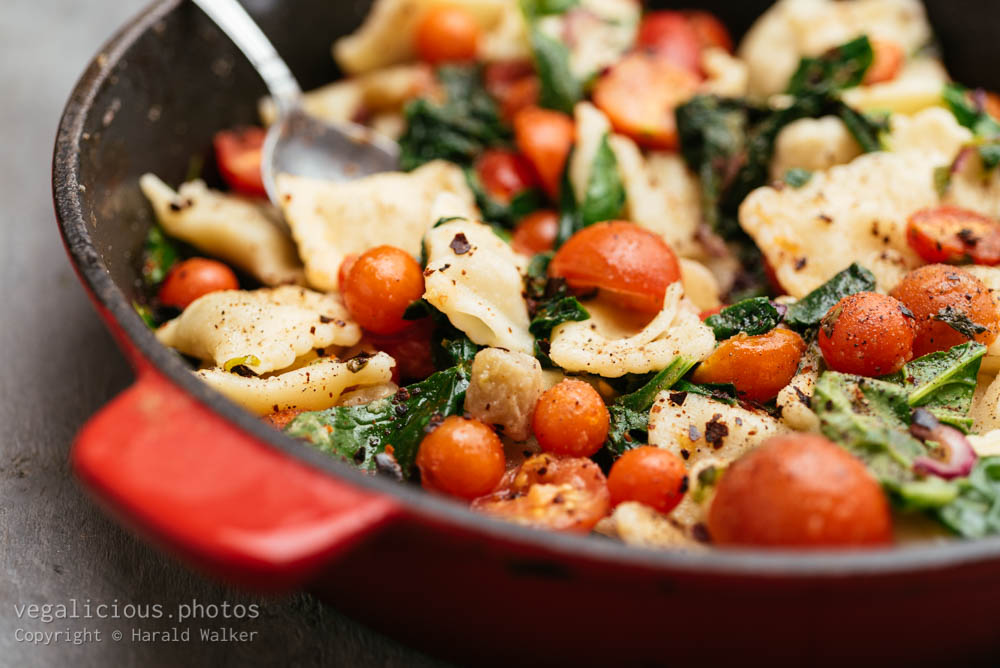 Stock photo of Ravioli with Sauteed spinach and Cherry Tomatoes