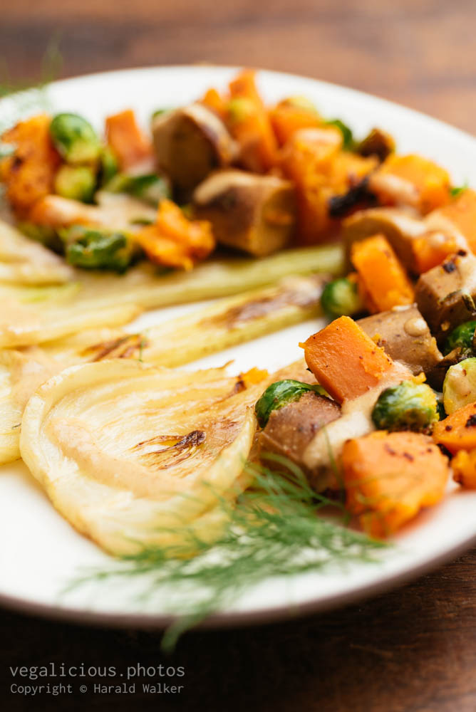 Stock photo of Sweet Potato, Fennel, Brussels Sprout Pan with Vegan sausages