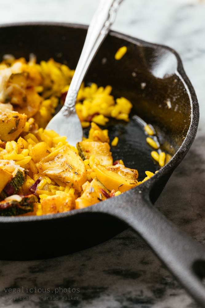 Stock photo of Zucchini Casserole on Yellow Rice