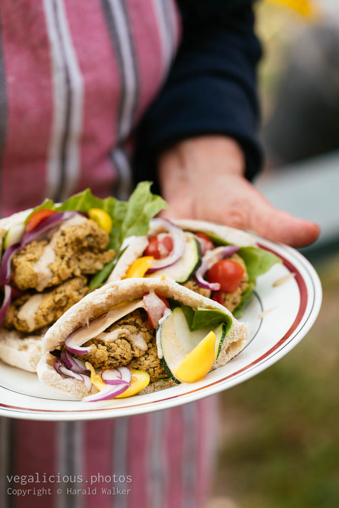 Stock photo of Serving falafels in pita breads