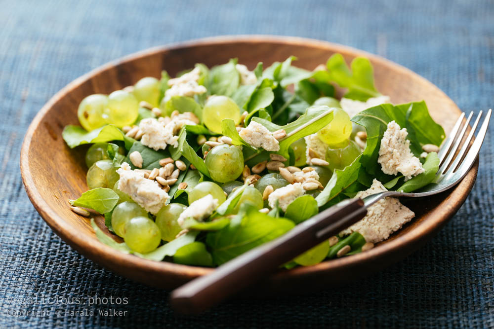 Stock photo of Arugula with Grapes, Feta and Sunflower Seeds