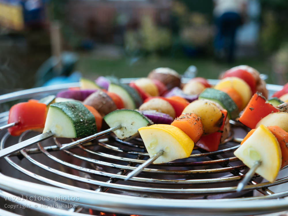 Stock photo of Grilling vegetables on skewers
