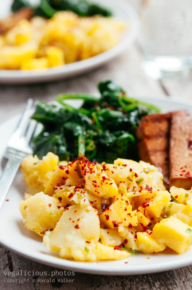 Stock photo of Grilled tofu with mango and chilli crushed potatoes