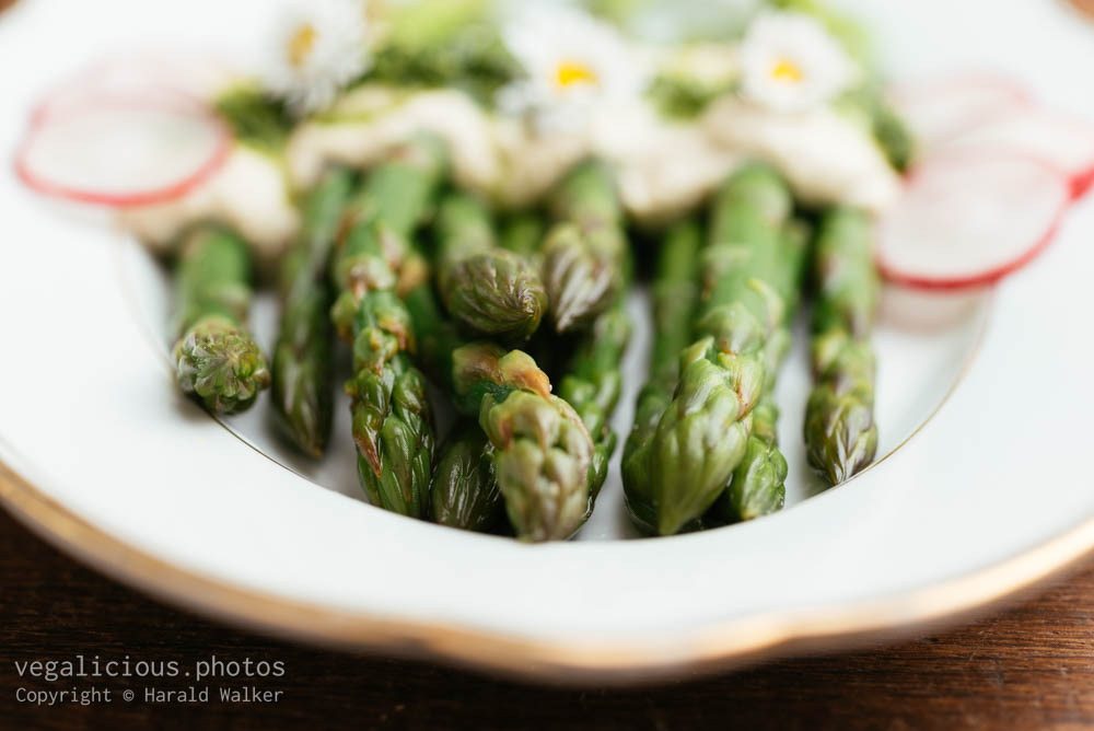 Stock photo of Asparagus with Vegan Feta Sauce and Ruccola Sauce