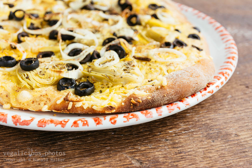 Stock photo of Artichoke and black olives pizza