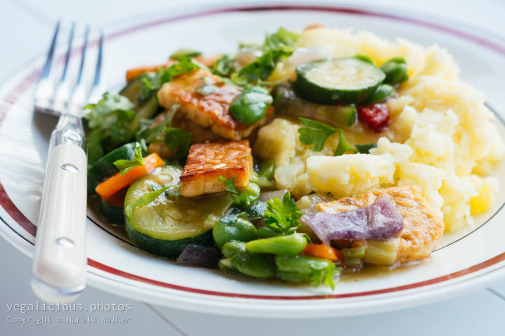 Stock photo of Braised Tempeh with Mixed Vegetables on Mashed Potatoes