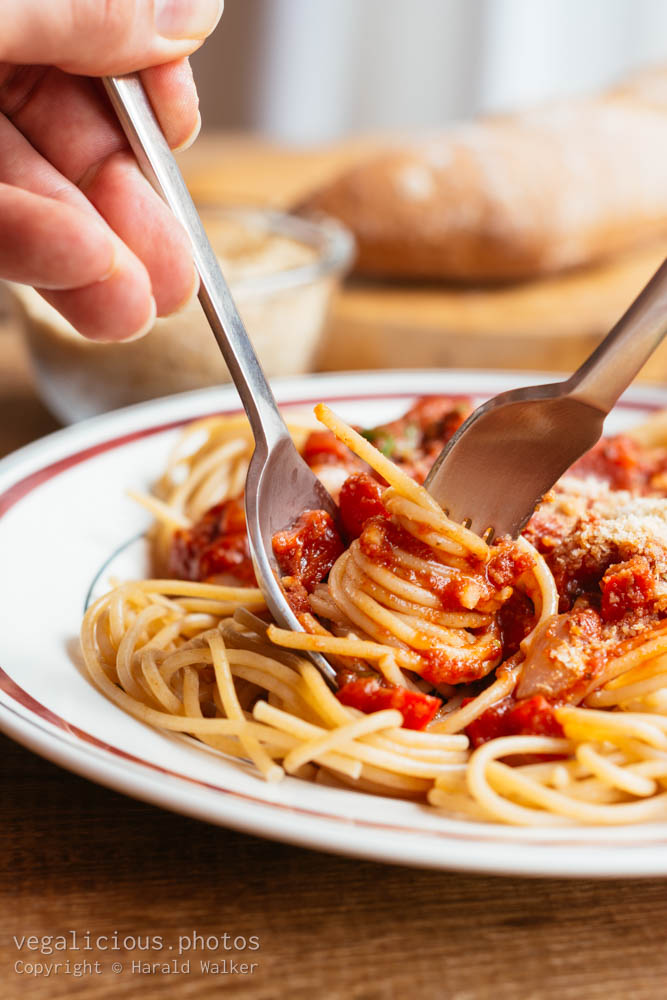 Stock photo of Wholewheat spaghetti with tomato sauce