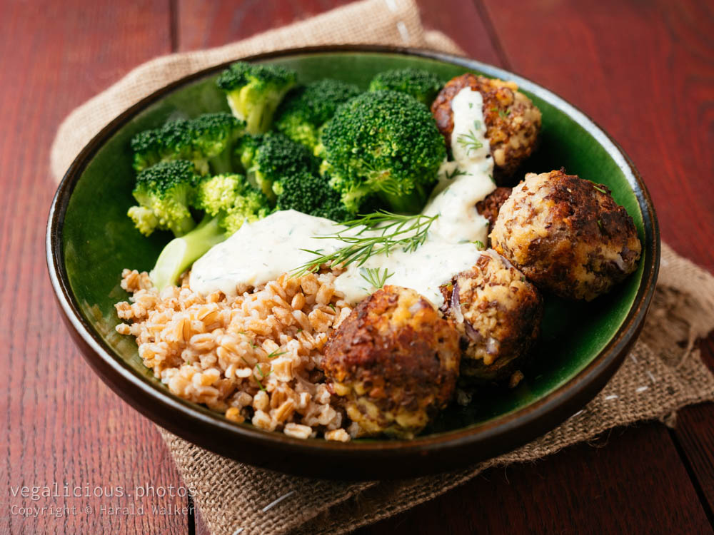 Stock photo of TVP Balls with Greek Style Lemon Yogurt Sauce on Farro