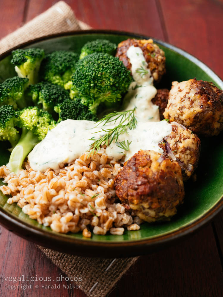 Stock photo of TVP Balls with Greek Style Lemon Yogurt Sauce on Farro