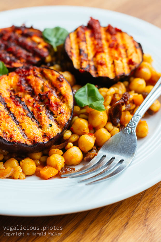 Stock photo of Grilled Eggplant with Harissa on Wheatberry Pilaf