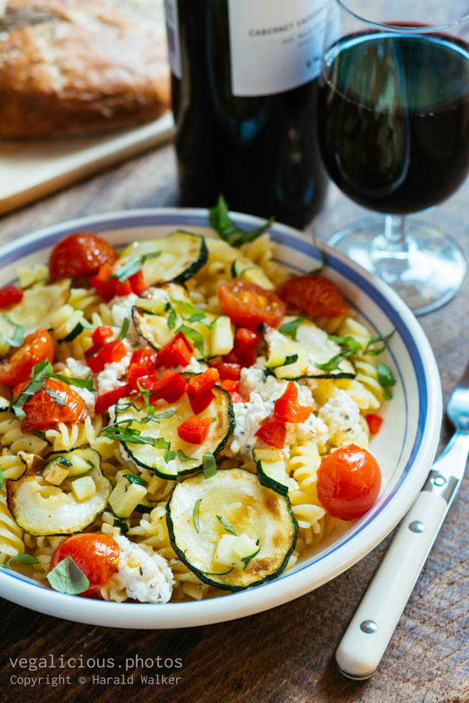 Stock photo of Zucchini, Cherry Tomatoes and Vegan Ricotta Pasta