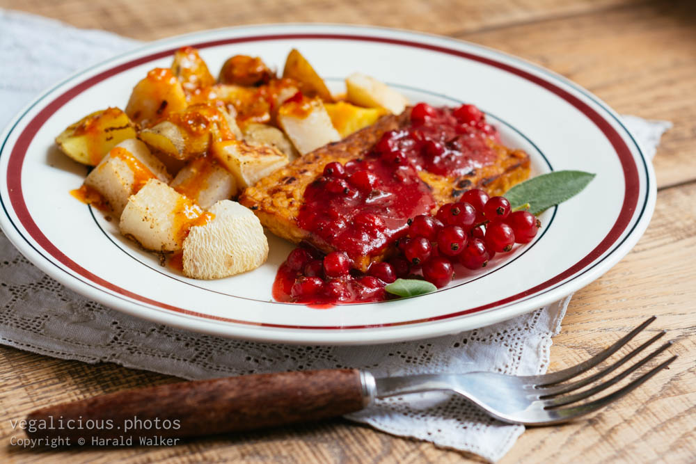 Stock photo of Braised Tempeh with Red currant, sage sauce