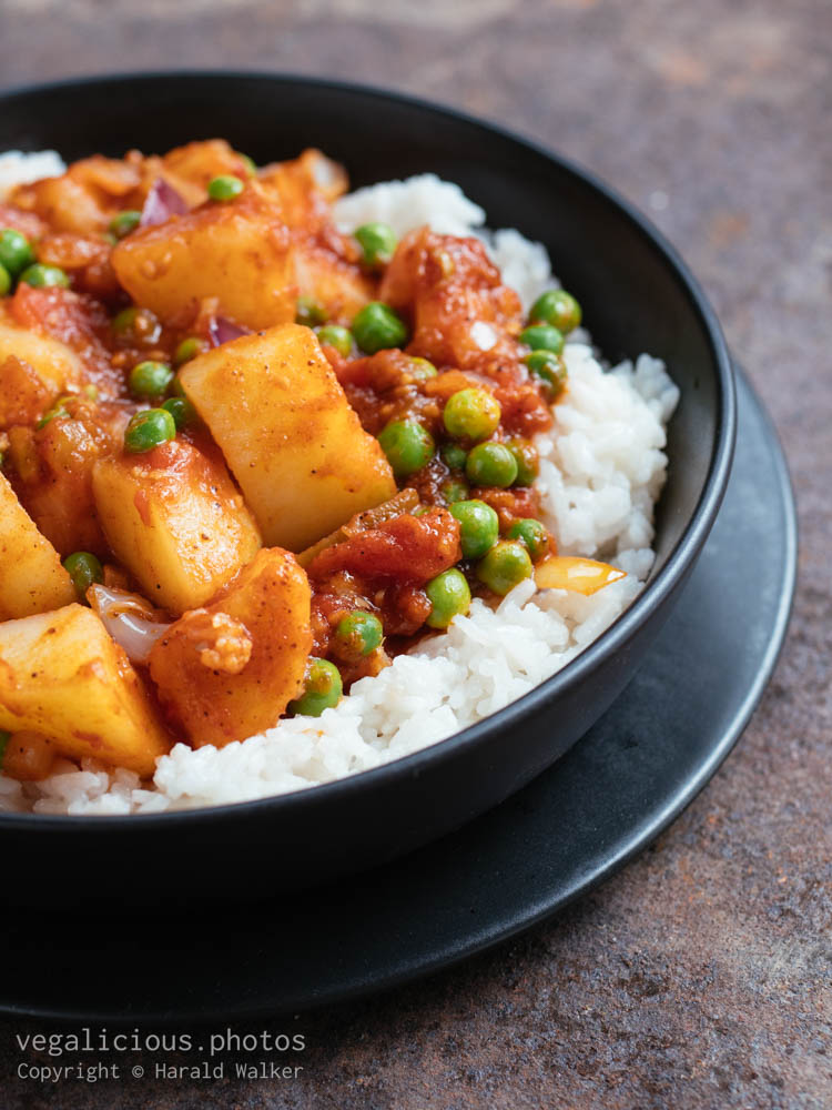 Stock photo of Potato and Pea Curry on Rice
