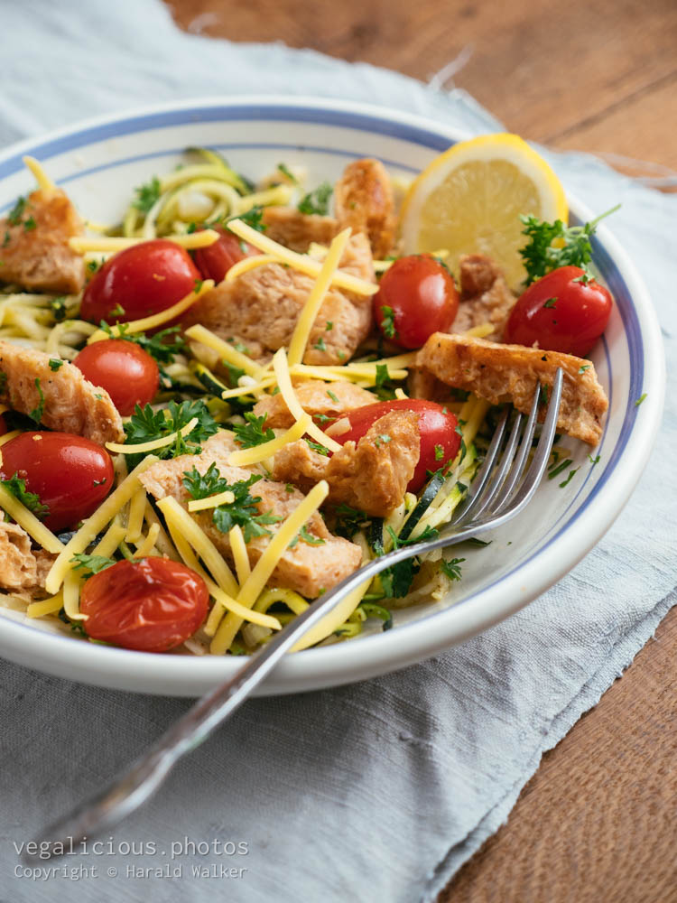Stock photo of Lemon TVP on Pasta with Cherry Tomatoes and Parsley