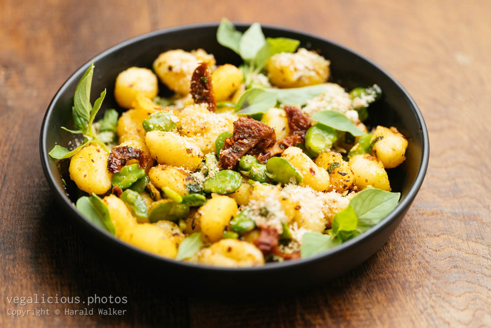 Stock photo of Gnocchi with fava beans and sun-dried tomatoes