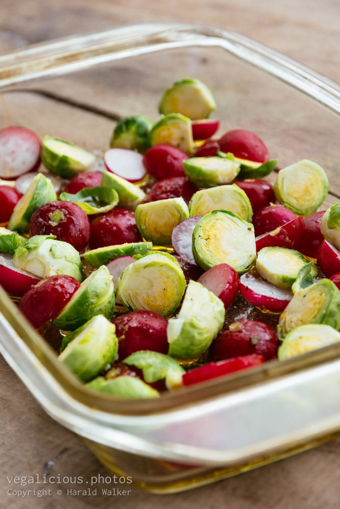 Stock photo of Making Roasted Brussels sprouts and Radishes