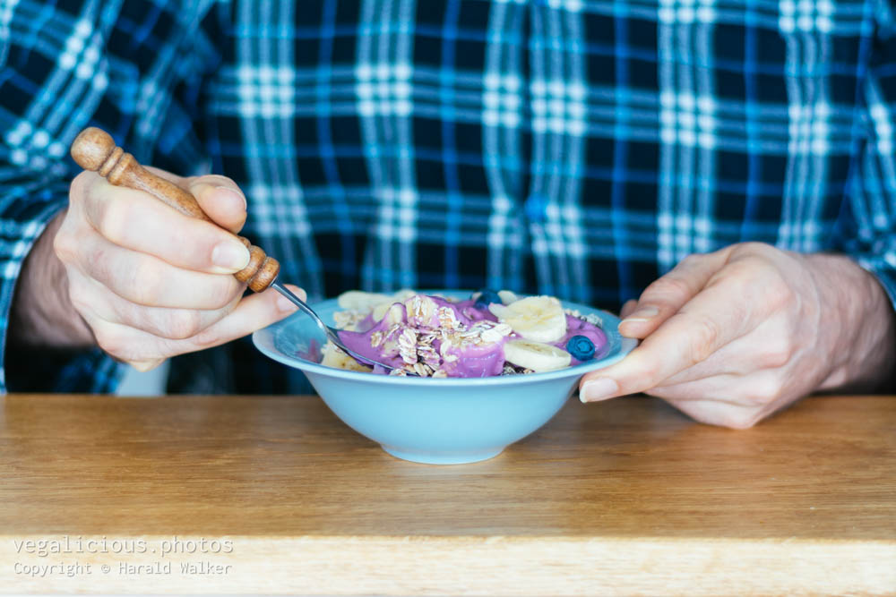 Stock photo of Eating granola for breakfast