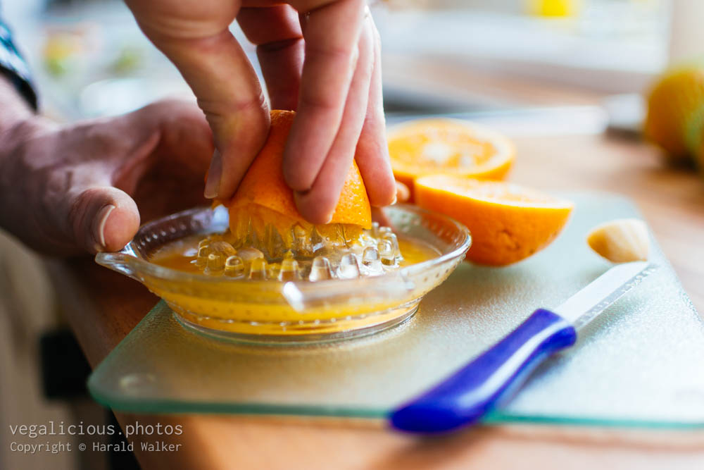 Stock photo of squeezing orange juice