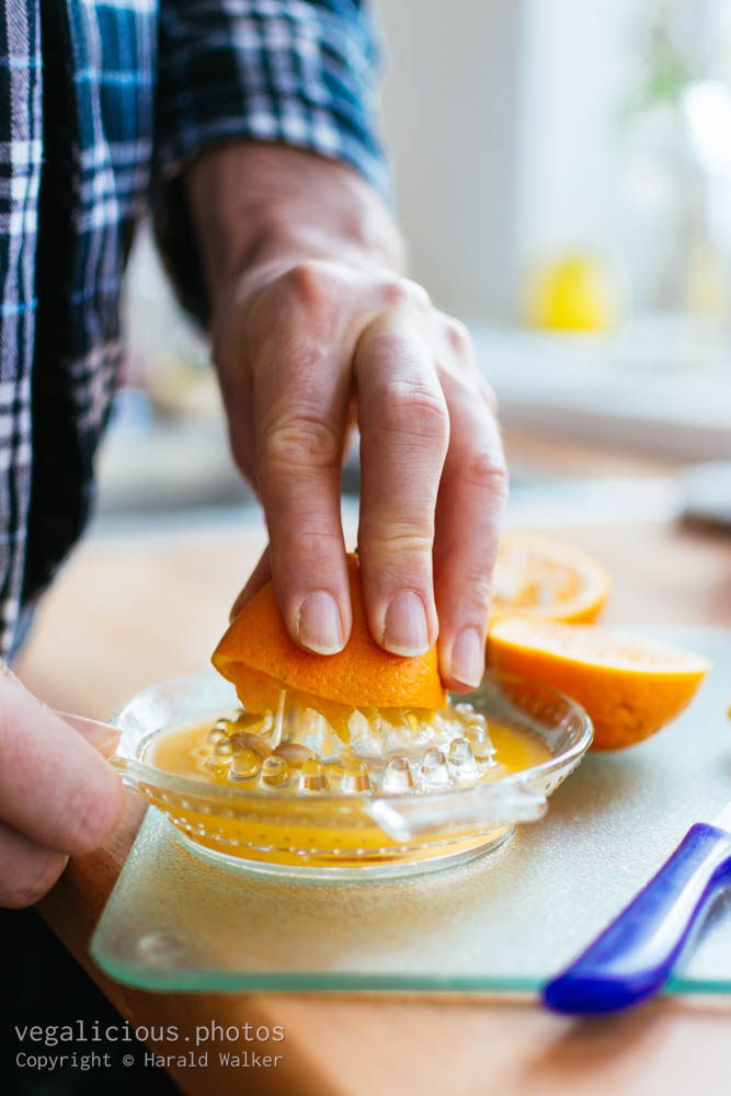 Stock photo of Making fresh orange juice