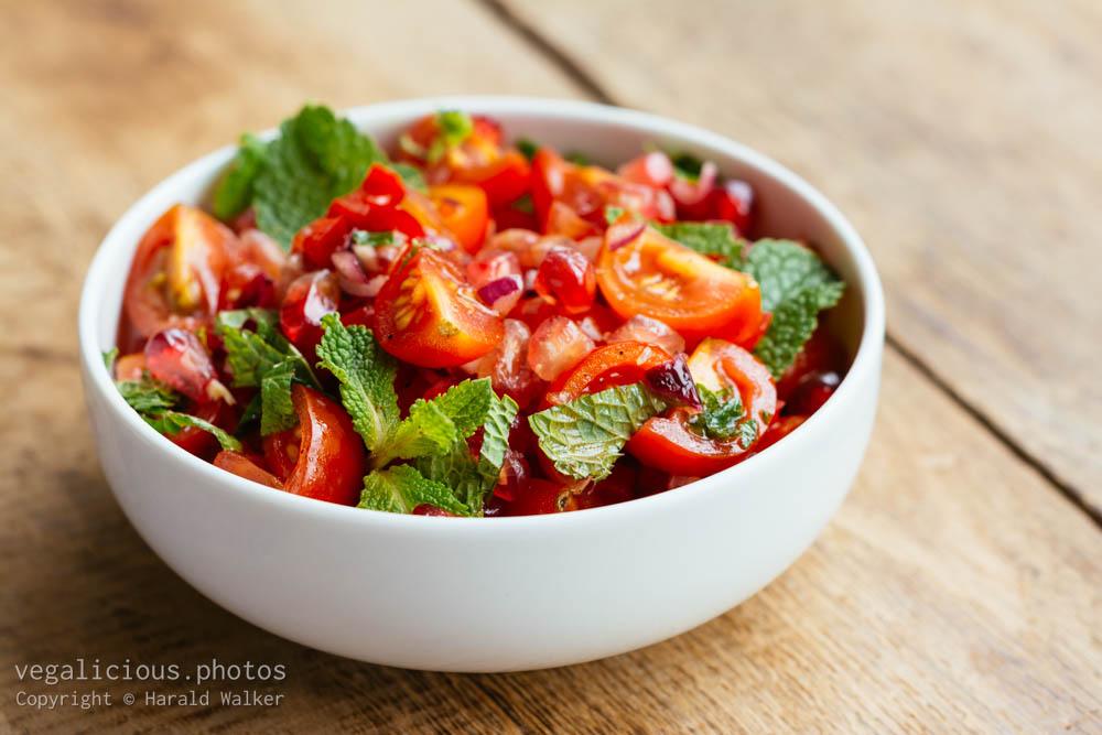 Stock photo of Tomato and pomegranate salad
