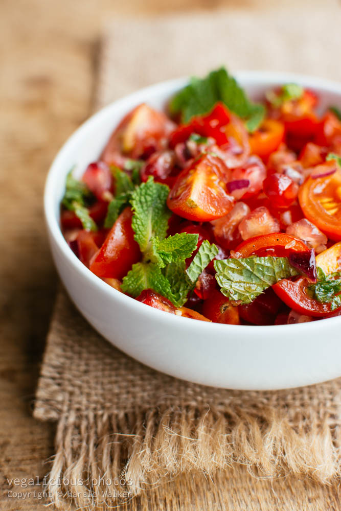 Stock photo of Tomato and pomegranate salad