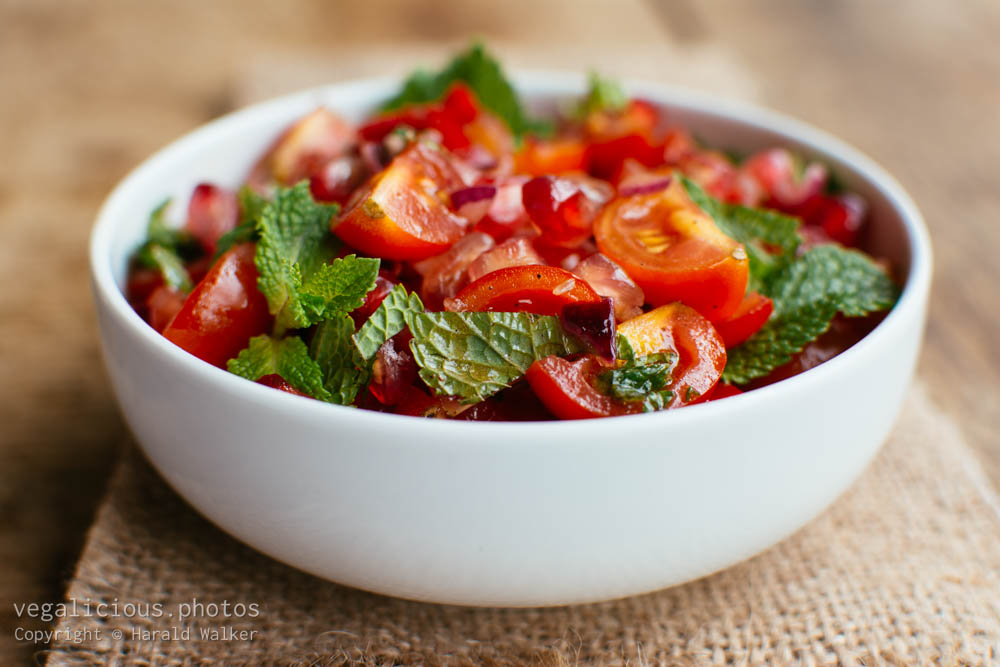 Stock photo of Tomato and pomegranate salad