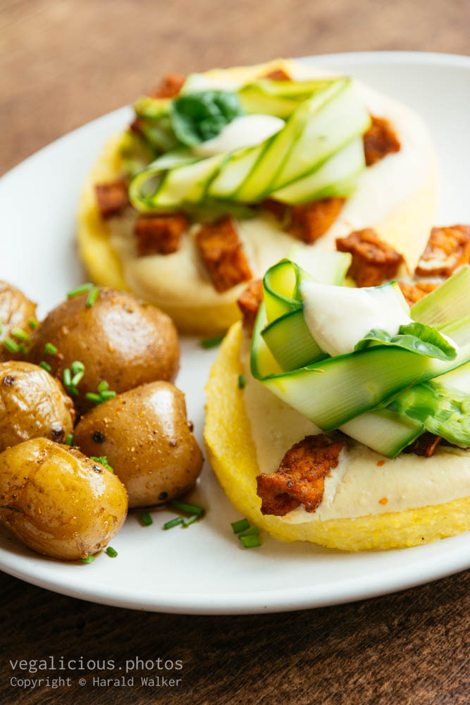 Stock photo of Polenta with Vegan Cheese Sauce, Spicy Tofu Pieces and asparagus