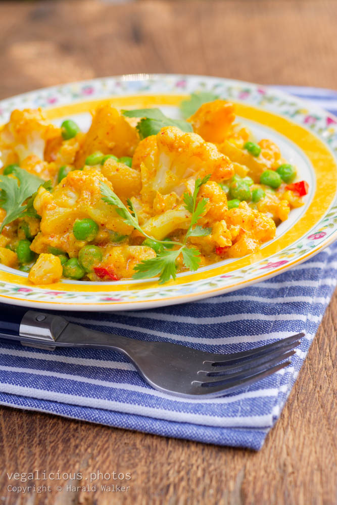 Stock photo of Indian Curried Cauliflower, Potatoes and Peas